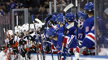 NEW YORK, NEW YORK - DECEMBER 22: The New York Rangers and the Anaheim Ducks salute Micheal Haley #38 and Nicolas Deslauriers #20 on their third period fight at Madison Square Garden on December 22, 2019 in New York City. The Rangers defeated the Ducks 5-1. (Photo by Bruce Bennett/Getty Images)