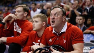 INDIANAPOLIS, IN - MARCH 19: Louisville Strength & Conditioning Coach Ray Ganong (R) cheers as the Louisville Cardinals take on the Michigan Wolverines in the second half during the second round of the 2017 NCAA Men's Basketball Tournament at the Bankers Life Fieldhouse on March 19, 2017 in Indianapolis, Indiana. (Photo by Joe Robbins/Getty Images)