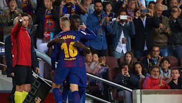 BARCELONA, SPAIN - SEPTEMBER 09: Ousmane Dembele of Barcelona embrances with substitute Gerard Deulofeu of Barcelona during the La Liga match between Barcelona and Espanyol at Camp Nou on September 9, 2017 in Barcelona, Spain. (Photo by Manuel Queimadelos Alonso/Getty Images)