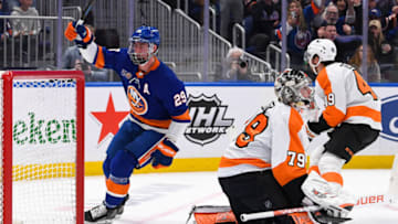 Apr 8, 2023; Elmont, New York, USA; New York Islanders center Brock Nelson (29) celebrates his goal against Philadelphia Flyers goaltender Carter Hart (79) during the second period at UBS Arena. Mandatory Credit: Dennis Schneidler-USA TODAY Sports