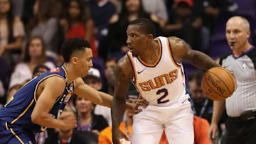 PHOENIX, AZ - OCTOBER 13: Eric Bledsoe #2 of the Phoenix Suns handles the ball against Travis Trice #0 of the Brisbane Bullets during the first half of the NBA preseason game at Talking Stick Resort Arena on October 13, 2017 in Phoenix, Arizona. NOTE TO USER: User expressly acknowledges and agrees that, by downloading and or using this photograph, User is consenting to the terms and conditions of the Getty Images License Agreement. (Photo by Christian Petersen/Getty Images)