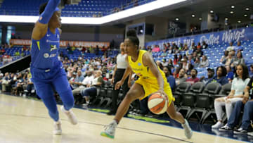 ARLINGTON, TX - MAY 19: Shenise Johnson #42 of the Indiana Fever handles the ball against the Dallas Wings on May 19, 2019 at the College Park Arena in Arlington, Texas. NOTE TO USER: User expressly acknowledges and agrees that, by downloading and or using this photograph, User is consenting to the terms and conditions of the Getty Images License Agreement. Mandatory Copyright Notice: Copyright 2019 NBAE (Photo by Tim Heitman/NBAE via Getty Images)