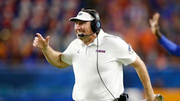 MIAMI, FLORIDA - DECEMBER 30: Head coach Dan Mullen of the Florida Gators reacts against the Virginia Cavaliers during the first half of the Capital One Orange Bowl at Hard Rock Stadium on December 30, 2019 in Miami, Florida. (Photo by Michael Reaves/Getty Images)