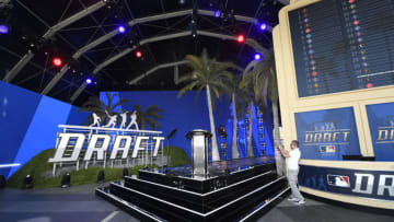 Workers prepare the stage for the 2022 MLB Draft at XBOX Plaza on July 17, 2022 in Los Angeles, California. (Photo by Kevork Djansezian/Getty Images)