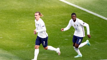 Antoine Griezmann of France celebrates with Ousmane Dembele . (Photo by Laszlo Balogh - Pool/Getty Images)