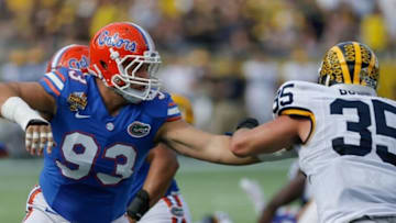 Jan 1, 2016; Orlando, FL, USA; Michigan Wolverines linebacker Joe Bolden (35) is guarded by Florida Gators defensive lineman Taven Bryan (93) during the first quarter in the 2016 Citrus Bowl at Orlando Citrus Bowl Stadium. Mandatory Credit: Reinhold Matay-USA TODAY Sports