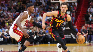 Trae Young #11 of the Atlanta Hawks dribbles against Jimmy Butler #22 of the Miami Heat(Photo by Michael Reaves/Getty Images)