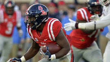 Nov 26, 2016; Oxford, MS, USA; Mississippi Rebels running back Akeem Judd (21) runs the ball during the second quarter of the game against the Mississippi State Bulldogs at Vaught-Hemingway Stadium. Mandatory Credit: Matt Bush-USA TODAY Sports