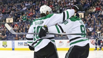 Dec 29, 2015; Columbus, OH, USA; Dallas Stars left wing Patrick Sharp (10) celebrates with center Jason Spezza (90) after scoring a goal in the third period against the Columbus Blue Jackets at Nationwide Arena. The Jackets won 6-3. Mandatory Credit: Aaron Doster-USA TODAY Sports