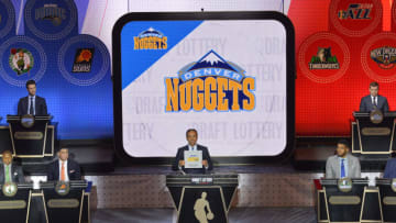 NEW YORK, NEW YORK - MAY 17: Mark Tatum, NBA's deputy commissioner, announces the Denver Nuggets as the #7 pick during the 2016 NBA Draft Lottery at the New York Hilton in New York, New York. NOTE TO USER: User expressly acknowledges and agrees that, by downloading and or using this Photograph, user is consenting to the terms and conditions of the Getty Images License Agreement. Mandatory Copyright Notice: Copyright 2016 NBAE (Photo by David Dow/NBAE via Getty Images)