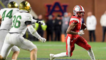 Saraland's Ryan Williams carries the ball against Mountain Brook during the AHSAA Class 6A State Football Championship Game at Jordan Hare Stadium in Auburn, Ala., on Friday December 2, 2022.Ms02