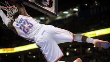 Apr 7, 2015; Oklahoma City, OK, USA; Oklahoma City Thunder guard Dion Waiters (23) dunks the ball against the San Antonio Spurs during the second quarter at Chesapeake Energy Arena. Mandatory Credit: Mark D. Smith-USA TODAY Sports