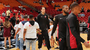 MIAMI, FL - OCTOBER 9: Kelly Olynyk #9 of the Miami Heat gets introduced before the preseason game against the Charlotte Hornets on October 9, 2017 at American Airlines Arena in Miami, Florida. NOTE TO USER: User expressly acknowledges and agrees that, by downloading and or using this Photograph, user is consenting to the terms and conditions of the Getty Images License Agreement. Mandatory Copyright Notice: Copyright 2017 NBAE (Photo by Oscar Baldizon/NBAE via Getty Images)