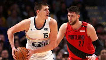 DENVER, COLORADO - JANUARY 13: Nikola Jokic #15 of the Denver Nuggets is guarded by Jusuf Nurkic #27 of the Portland Trail Blazers at the Pepsi Center on January 13, 2019 in Denver, Colorado. NOTE TO USER: User expressly acknowledges and agrees that, by downloading and or using this photograph, User is consenting to the terms and conditions of the Getty Images License Agreement. (Photo by Matthew Stockman/Getty Images)