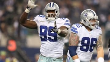 Dec 29, 2013; Arlington, TX, USA; Dallas Cowboys defensive end George Selvie (99) celebrates a sack in the third quarter against the Philadelphia Eagles at AT&T Stadium. Mandatory Credit: Matthew Emmons-USA TODAY Sports
