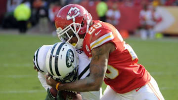 Nov 2, 2014; Kansas City, MO, USA; New York Jets wide receiver Jeremy Kerley (11) is tackled by Kansas City Chiefs strong safety Eric Berry (29) in the second half at Arrowhead Stadium. Kansas City won the game 24-10. Mandatory Credit: John Rieger-USA TODAY Sports
