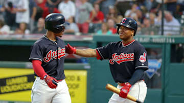 CLEVELAND, OH - JULY 11: Cleveland Indians shortstop Francisco Lindor (12) is congratulated by Cleveland Indians third baseman Jose Ramirez (11) after hitting a 3-run home run during the fourth inning of the Major League Baseball Interleague game between the Cincinnati Reds and Cleveland Indians on July 11, 2018, at Progressive Field in Cleveland, OH. (Photo by Frank Jansky/Icon Sportswire via Getty Images)