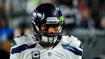 Dec 21, 2014; Glendale, AZ, USA; Seattle Seahawks quarterback Russell Wilson (3) looks on during the second half against the Arizona Cardinals at University of Phoenix Stadium. Mandatory Credit: Matt Kartozian-USA TODAY Sports