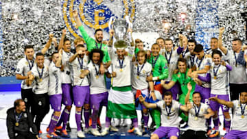 CARDIFF, WALES - JUNE 03: In this handout image provided by UEFA, Sergio Ramos of Real Madrid lifts The Champions League trophy after the UEFA Champions League Final between Juventus and Real Madrid at National Stadium of Wales on June 3, 2017 in Cardiff, Wales. (Photo by Handout/UEFA via Getty Images)