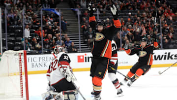 ANAHEIM, CALIFORNIA - JANUARY 29: Adam Henrique #14 of the Anaheim Ducks reacts after scoring a goal as Antii Raanta #32 of the Arizona Coyotes looks on during the first period of game at Honda Center on January 29, 2020 in Anaheim, California. (Photo by Sean M. Haffey/Getty Images)