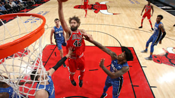 CHICAGO, IL - DECEMBER 20: Robin Lopez #42 of the Chicago Bulls shoots the ball against the Orlando Magic on December 20, 2017 at the United Center in Chicago, Illinois. NOTE TO USER: User expressly acknowledges and agrees that, by downloading and or using this Photograph, user is consenting to the terms and conditions of the Getty Images License Agreement. Mandatory Copyright Notice: Copyright 2017 NBAE (Photo by Gary Dineen/NBAE via Getty Images)