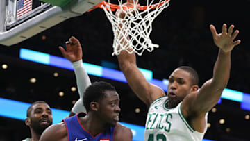 BOSTON, MA - OCTOBER 30: Kyrie Irving #11 of the Boston Celtics and Al Horford #42 defend a shot from Reggie Jackson #1 of the Detroit Pistons at TD Garden on October 30, 2018 in Boston, Massachusetts. (Photo by Maddie Meyer/Getty Images)