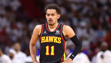 MIAMI, FLORIDA - APRIL 17: Trae Young #11 of the Atlanta Hawks looks on against the Miami Heat during the first half in Game One of the Eastern Conference First Round at FTX Arena on April 17, 2022 in Miami, Florida. NOTE TO USER: User expressly acknowledges and agrees that, by downloading and or using this photograph, User is consenting to the terms and conditions of the Getty Images License Agreement. (Photo by Michael Reaves/Getty Images)