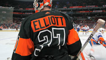 PHILADELPHIA, PA - MARCH 23: Brian Elliott #37 of the Philadelphia Flyers looks on during warm-ups against the New York Islanders on March 23, 2019 at the Wells Fargo Center in Philadelphia, Pennsylvania. (Photo by Len Redkoles/NHLI via Getty Images)