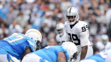 Oct 25, 2015; San Diego, CA, USA; Oakland Raiders outside linebacker Aldon Smith (99) looks across the line during the first quarter against the San Diego Chargers at Qualcomm Stadium. Mandatory Credit: Jake Roth-USA TODAY Sports