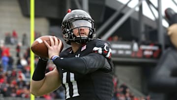 Oct 31, 2015; Cincinnati, OH, USA; Cincinnati Bearcats quarterback Gunner Kiel (11) throws a pass during warmups prior to the game against the UCF Knights at Nippert Stadium. Mandatory Credit: Aaron Doster-USA TODAY Sports