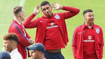 GLASGOW, SCOTLAND - JUNE 09: Phil Jones and Chris Smalling of England in discussion as they walk on the pitch on the eve of their FIFA World Cup qualifier against Scotland at Hampden Park on June 9, 2017 in Glasgow, Scotland. (Photo by Steve Welsh/Getty Images)