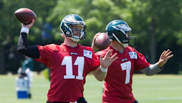 Jun 9, 2016; Philadelphia, PA, USA; Philadelphia Eagles quarterback Carson Wentz (11) and quarterback Sam Bradford (7) throw during mini camp at NovaCare Complex. Mandatory Credit: Bill Streicher-USA TODAY Sports