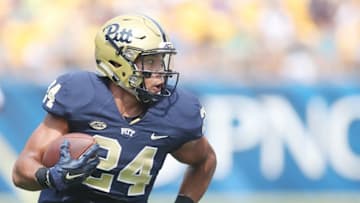 Sep 5, 2015; Pittsburgh, PA, USA; Pittsburgh Panthers running back James Conner (24) rushes the ball against the Youngstown State Penguins during the first half at Heinz Field. The Panthers won 45-37. Mandatory Credit: Charles LeClaire-USA TODAY Sports