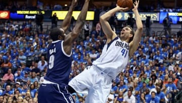 Apr 23, 2016; Dallas, TX, USA; Dallas Mavericks forward Dirk Nowitzki (41) shoots as Oklahoma City Thunder forward Serge Ibaka (9) defends during the second quarter in game four of the first round of the NBA Playoffs at American Airlines Center. Mandatory Credit: Kevin Jairaj-USA TODAY Sports