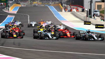 LE CASTELLET, FRANCE - JUNE 24: Lewis Hamilton of Great Britain driving the (44) Mercedes AMG Petronas F1 Team Mercedes WO9, Valtteri Bottas driving the (77) Mercedes AMG Petronas F1 Team Mercedes WO9, Max Verstappen of the Netherlands driving the (33) Aston Martin Red Bull Racing RB14 TAG Heuer (Photo by Mark Thompson/Getty Images)