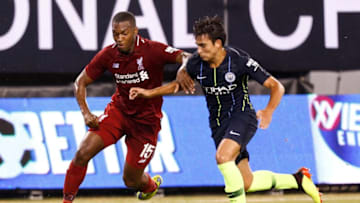 EAST RUTHERFORD, NJ - JULY 25: Daniel Sturridge #15 of Liverpool fights for the ball with Brahim Diaz #55 of Manchester City during their match at MetLife Stadium on July 25, 2018 in East Rutherford, New Jersey. (Photo by Jeff Zelevansky/Getty Images)