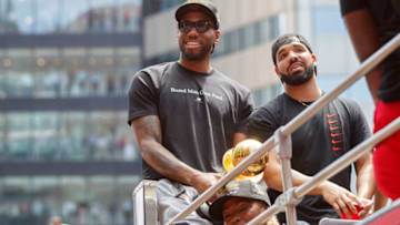 TORONTO, ON - JUNE 17: Kawhi Leonard #2 of the Toronto Raptors and Rapper Drake are seen on the team bus during the Toronto Raptors Championship Victory Parade on June 17, 2019 in Toronto, Ontario. NOTE TO USER: User expressly acknowledges and agrees that, by downloading and/or using this photograph, user is consenting to the terms and conditions of Getty Images License Agreement. Mandatory Copyright Notice: Copyright 2019 NBAE (Photo by Mark Blinch/NBAE via Getty Images)