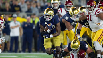 SOUTH BEND, IN - OCTOBER 21: Notre Dame Fighting Irish running back Josh Adams (33) runs up the middle during the college football game between the Notre Dame Fighting Irish and USC Trojans on October 21, 2017, at Notre Dame Stadium in South Bend, IN. (Photo by Zach Bolinger/Icon Sportswire via Getty Images)