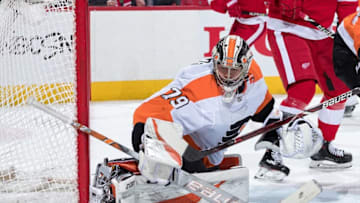 DETROIT, MI - FEBRUARY 17: Goaltender Carter Hart #79 of the Philadelphia Flyers follows the play during an NHL game against the Detroit Red Wings at Little Caesars Arena on February 17, 2019 in Detroit, Michigan. (Photo by Dave Reginek/NHLI via Getty Images)