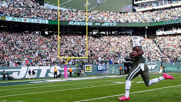 Oct 23, 2016; East Rutherford, NJ, USA; New York Jets wide receiver Quincy Enunwa (81) runs for a touchdown after catching a pass from Geno Smith (not shown) during the first half of their game against the Baltimore Ravens at MetLife Stadium. Mandatory Credit: Ed Mulholland-USA TODAY Sports