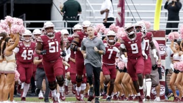 TALLAHASSEE, FL - OCTOBER 29: Head Coach Mike Norvell of the Florida State Seminoles leads his team into the field prior to the game against the Georgia Tech Yellow Jackets at Doak Campbell Stadium on Bobby Bowden Field on October 29, 2022 in Tallahassee, Florida. The Seminoles defeated the Yellow Jackets 41-16. (Photo by Don Juan Moore/Getty Images)