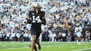 Sep 30, 2023; Nashville, Tennessee, USA; Vanderbilt Commodores wide receiver Will Sheppard (14) scores a touchdown against the Missouri Tigers during the second half at FirstBank Stadium. Mandatory Credit: Steve Roberts-USA TODAY Sports