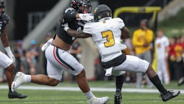 Cincinnati Bearcats linebacker Ivan Pace Jr makes a tackle against Kennesaw State at Nippert Stadium. Getty Images.