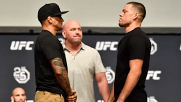 LOS ANGELES, CA - AUGUST 03: (L-R) Opponents Dustin Poirier and Nate Diaz face off during the UFC press conference inside the Orpheum Theater on August 3, 2018 in Los Angeles, California. (Photo by Jeff Bottari/Zuffa LLC/Zuffa LLC via Getty Images)