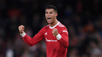 MANCHESTER, ENGLAND - SEPTEMBER 29: Cristiano Ronaldo of Manchester United celebrates their side's victory after the UEFA Champions League group F match between Manchester United and Villarreal CF at Old Trafford on September 29, 2021 in Manchester, England. (Photo by Laurence Griffiths/Getty Images)