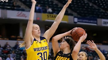Mar 03 2016: Iowa Hawkeyes forward Megan Gustafson (10) makes a move to get past Michigan Wolverines center Hallie Thome (30) during the Women's Big Ten Tournament game between the Michigan vs Iowa at Bankers Life Fieldhouse in Indianapolis, IN. (Photo by Jeffrey Brown/Icon Sportswire) (Photo by Jeffrey Brown/Icon Sportswire/Corbis via Getty Images)