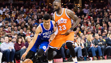 CLEVELAND, OH - MARCH 31: Timothe Luwawu-Cabarrot #20 of the Philadelphia 76ers drives around LeBron James #23 of the Cleveland Cavaliers during the first half at Quicken Loans Arena on March 31, 2017 in Cleveland, Ohio. NOTE TO USER: User expressly acknowledges and agrees that, by downloading and/or using this photograph, user is consenting to the terms and conditions of the Getty Images License Agreement. (Photo by Jason Miller/Getty Images)