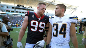 CARSON, CALIFORNIA - SEPTEMBER 22: Defensive end J.J. Watt #99 of the Houston Texans and brother fullback Derek Watt #34 of the Los Angeles Chargers talk after the game at Dignity Health Sports Park on September 22, 2019 in Carson, California. (Photo by Meg Oliphant/Getty Images)
