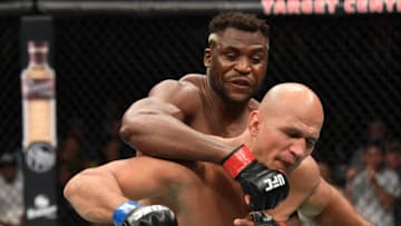 MINNEAPOLIS, MN - JUNE 29: (L-R) Francis Ngannou of Cameroon punches Junior Dos Santos of Brazil in their heavyweight bout during the UFC Fight Night event at the Target Center on June 29, 2019 in Minneapolis, Minnesota. (Photo by Josh Hedges/Zuffa LLC/Zuffa LLC via Getty Images)