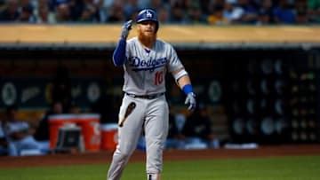 OAKLAND, CA - AUGUST 08: Justin Turner #10 of the Los Angeles Dodgers reacts after a called third strike during the fourth inning against the Oakland Athletics at the Oakland Coliseum on August 8, 2018 in Oakland, California. (Photo by Jason O. Watson/Getty Images)